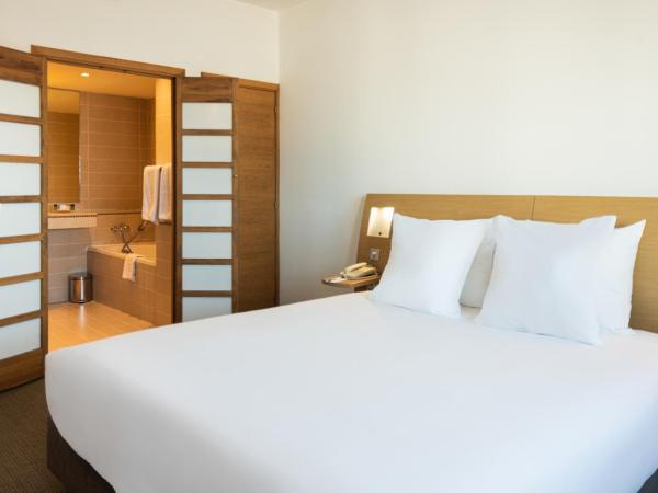 Novotel Casablanca City Center : photo 1 de la chambre suite junior - 1 lit king-size et canapé

