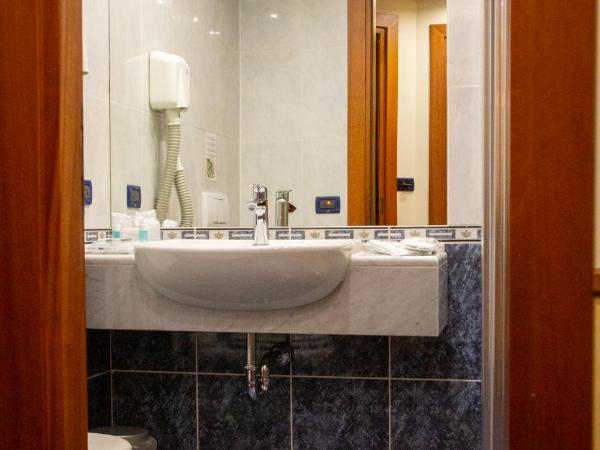 Pacific Hotel Fortino : photo 2 de la chambre petite chambre double