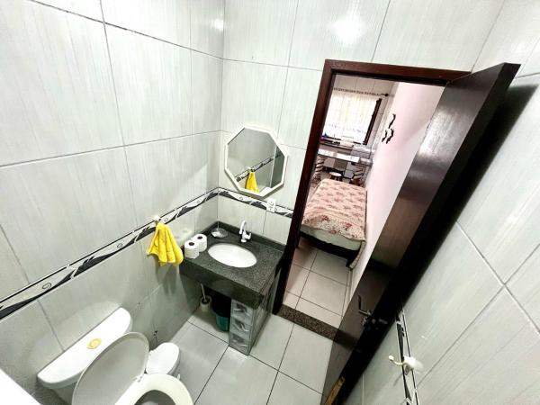 Pousada Recanto Das Emerências : photo 9 de la chambre studio familial