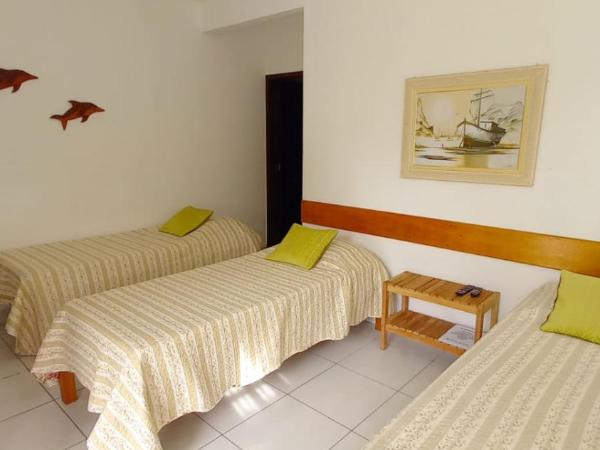 Pousada Recanto Das Emerências : photo 4 de la chambre studio familial