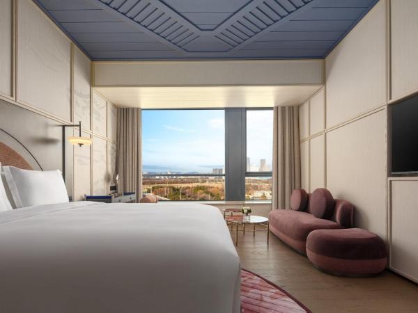 Hotel Indigo Wuxi Taihu New City : photo 7 de la chambre chambre lit king-size standard - vue sur jardin