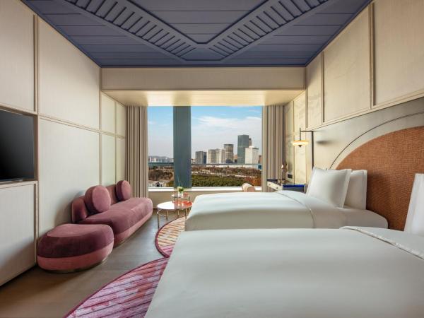 Hotel Indigo Wuxi Taihu New City : photo 4 de la chambre chambre double standard avec 2 lits doubles