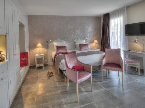 La Bastide de l'Oliveraie : photo 4 de la chambre suite junior - accès gratuit au spa 