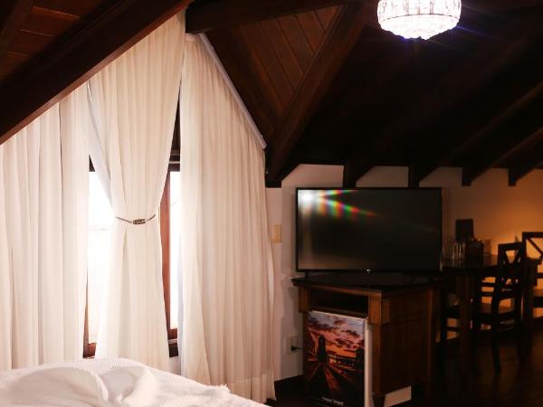 Johnscher by San Juan : photo 9 de la chambre suite lit king-size