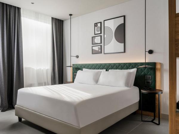 Hilton Garden Inn Bologna North : photo 5 de la chambre chambre lit king-size deluxe