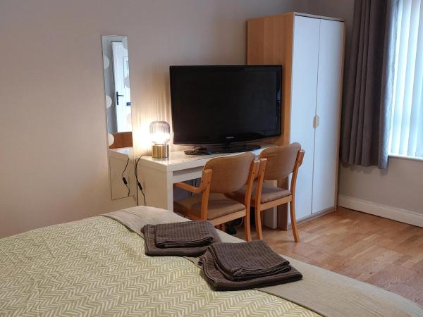 Lawnbrook Town House : photo 3 de la chambre chambre lit king-size