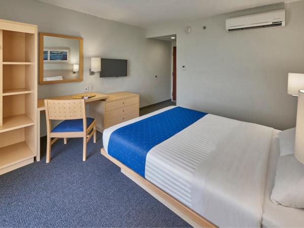 City Express by Marriott Puebla FINSA : photo 5 de la chambre chambre lit queen-size 