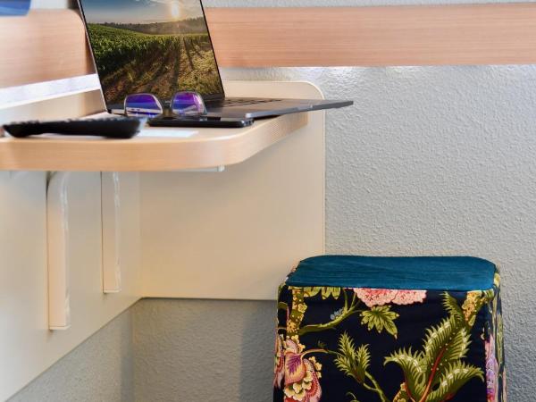 ibis budget Cholet Centre : photo 1 de la chambre chambre triple