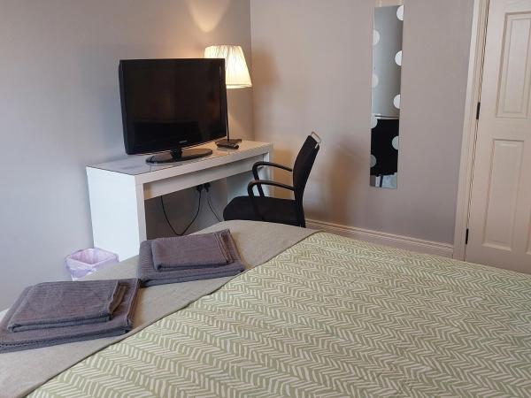 Lawnbrook Town House : photo 3 de la chambre chambre lit king-size