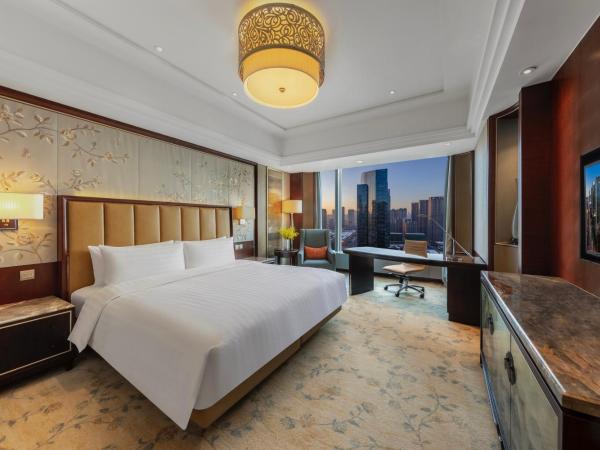 Shangri-La Shenyang : photo 4 de la chambre chambre lit king-size deluxe - vue sur ville