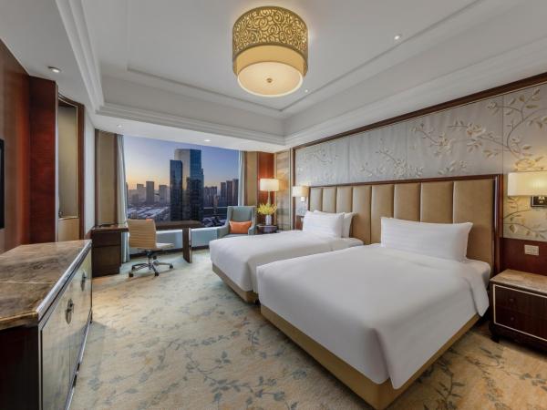 Shangri-La Shenyang : photo 4 de la chambre chambre lits jumeaux deluxe - vue sur ville