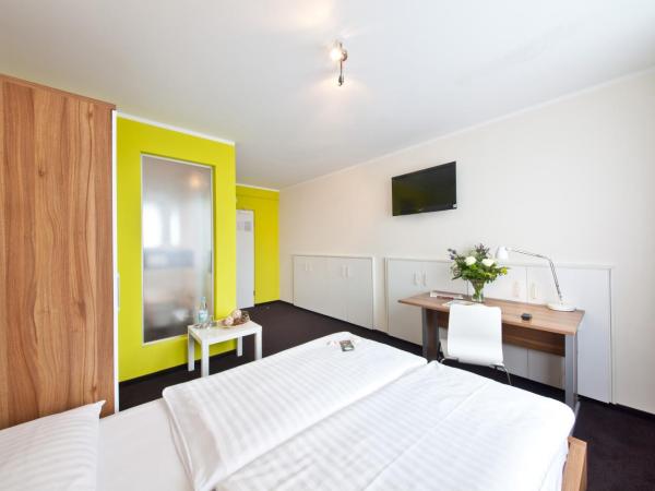 Novum Hotel Aviva Leipzig Neue Messe : photo 1 de la chambre chambre double avec 1 lit queen-size