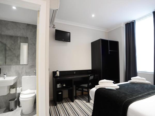 The 29 London : photo 4 de la chambre chambre lits jumeaux avec toilettes et douche