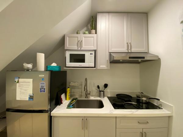 One Deluxe Bedroom Suite in Midtown : photo 2 de la chambre chambre lit queen-size deluxe