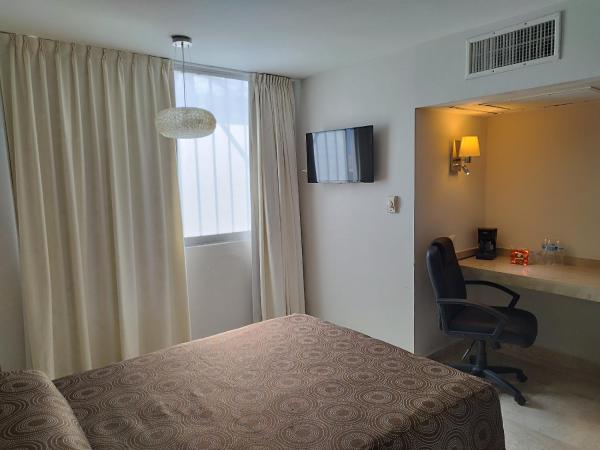 Hotel Mar y Tierra : photo 10 de la chambre chambre triple avec 3 lits doubles 