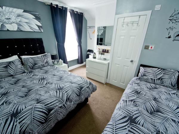 Rossall House , For Families & Couples : photo 2 de la chambre chambre triple deluxe