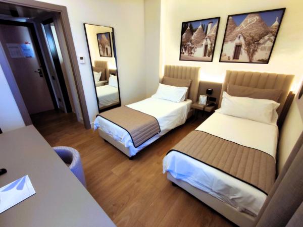 Vittoria Parc Hotel : photo 3 de la chambre chambre lits jumeaux