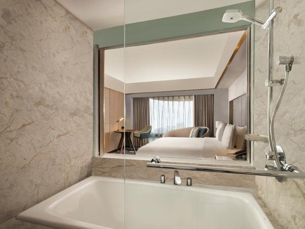 Sari Pacific Jakarta, Autograph Collection : photo 2 de la chambre grande deluxe single room with city view