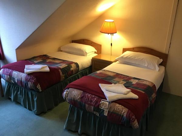 The Royal Crown Guest House : photo 2 de la chambre chambre lits jumeaux standard avec salle de bains commune