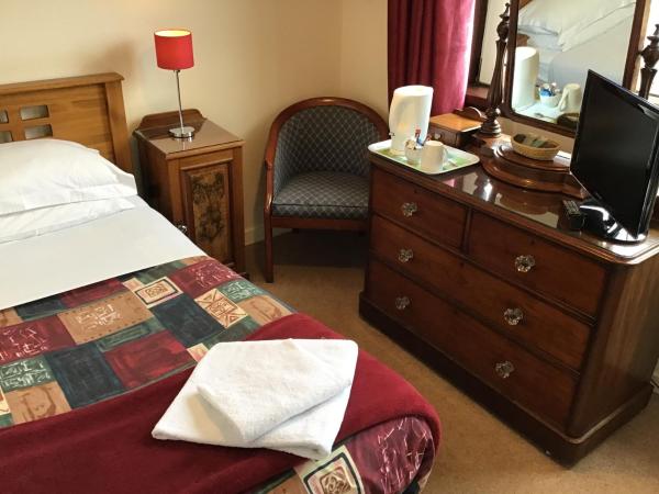 The Royal Crown Guest House : photo 2 de la chambre chambre simple avec toilettes et douche communes