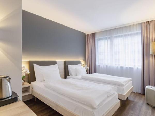 PLAZA INN Wien Gasometer : photo 2 de la chambre chambre lits jumeaux standard