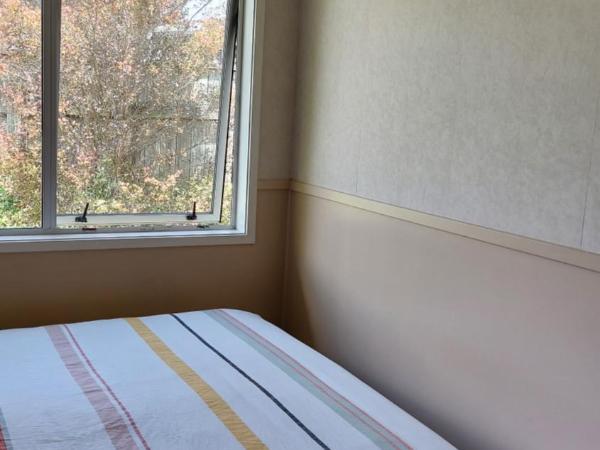 Bed and Breakfast Happy Home Taupo Accommodation : photo 6 de la chambre chambre lit queen-size 