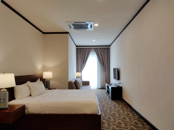 Riviera Suites Melaka : photo 4 de la chambre suite deluxe avec lit king-size