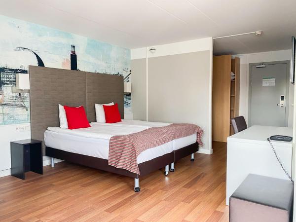 Good Morning+ Hägersten : photo 1 de la chambre chambre lits jumeaux standard +