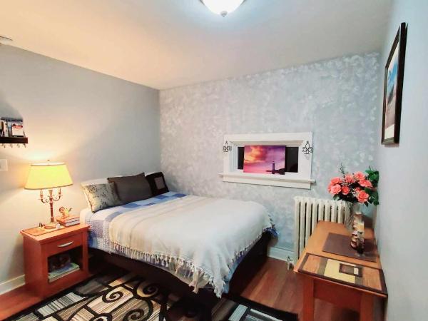 Merj's Guest House in Wolesly : photo 9 de la chambre chambre lit queen-size deluxe