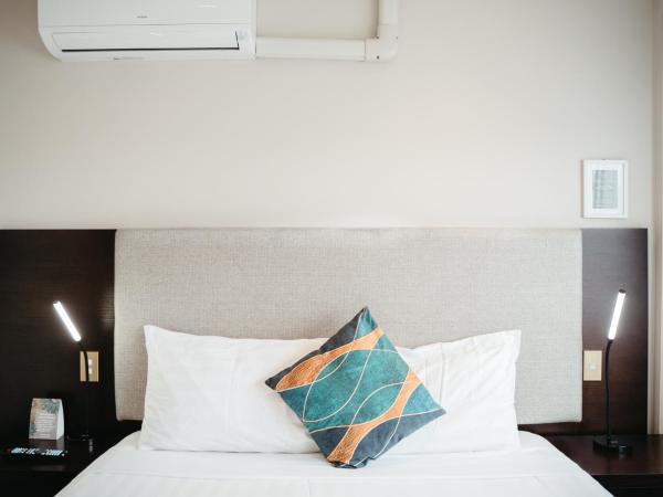 Auckland City Hotel - Hobson St : photo 2 de la chambre appartement en duplex 2 chambres avec lit simple et queen-size