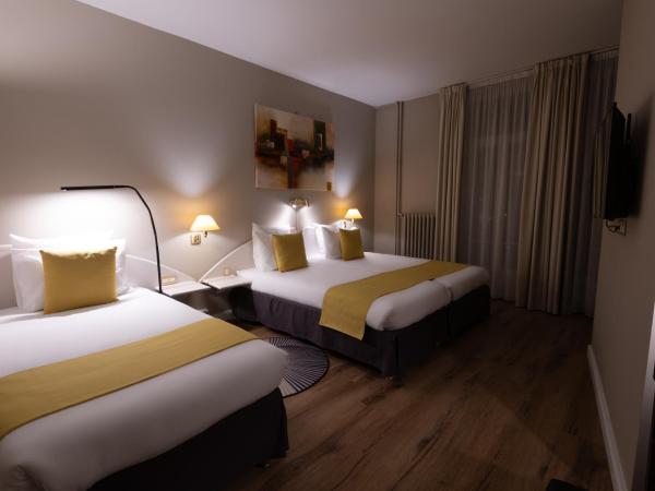 Grand Hôtel Du Tonneau D'Or : photo 1 de la chambre chambre supérieure familiale - vue citadelle