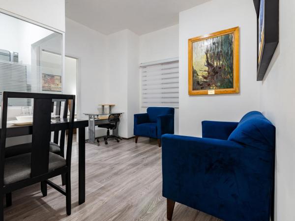 European Life Style Executive Suites : photo 5 de la chambre suite deluxe avec lit king-size