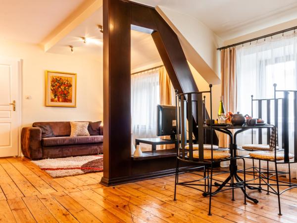 Home & Travel : photo 3 de la chambre suite 1 chambre avec canapé-lit