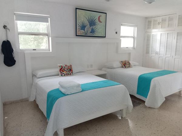 Hotel Downtown Merida : photo 8 de la chambre chambre familiale avec salle de bains privative