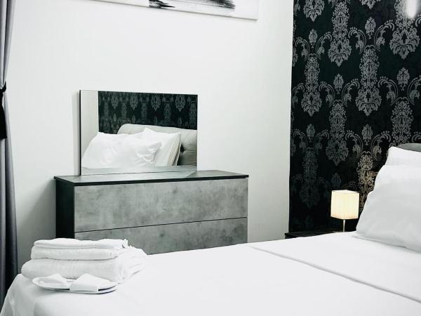 Seven Nights Bologna : photo 1 de la chambre chambre double avec salle de bains privative