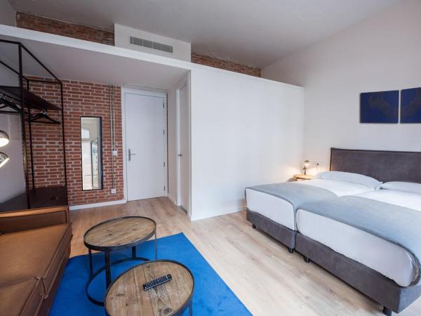 room00 Gran Vía Hostel : photo 1 de la chambre chambre double ou lits jumeaux supérieure