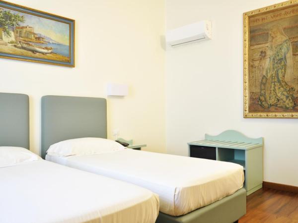 Hotel San Guido : photo 10 de la chambre chambre double ou lits jumeaux standard