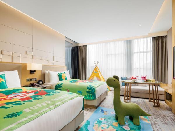 Chengdu Marriott Hotel Financial Centre : photo 9 de la chambre family room with two twin beds and twin towers view