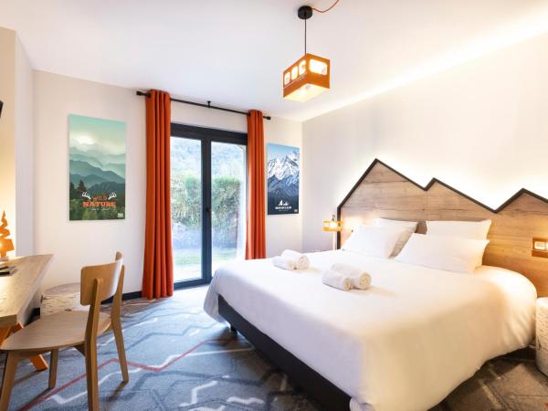 Hotel Base Camp Lodge - Albertville : photo 4 de la chambre chambre double ou lits jumeaux deluxe – vue sur jardin