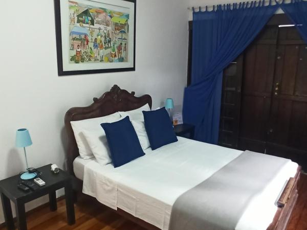 Pousada Estrela do Mar : photo 4 de la chambre chambre quadruple avec balcon