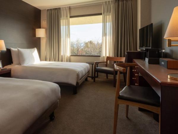Hilltop Resort Fukuoka : photo 2 de la chambre chambre lits jumeaux standard - vue sur montagne