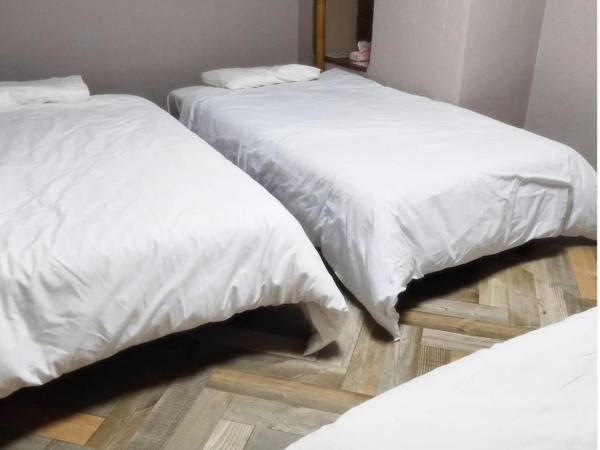 Osaka Guesthouse Sakura : photo 1 de la chambre chambre triple