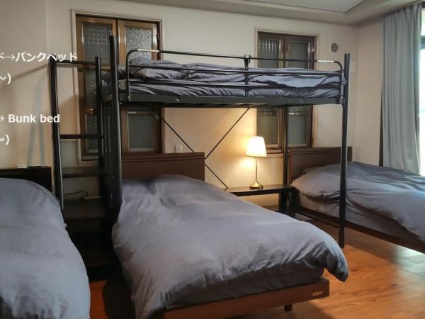 Oyado Kien Ryogoku : photo 1 de la chambre chambre quadruple avec salle de bains commune
