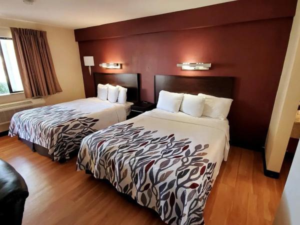 Sacramento Inn & Suites : photo 1 de la chambre chambre double ou lits jumeaux deluxe - vue sur ville 