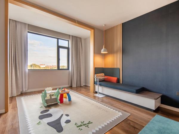 Holiday Inn Express Shanghai Jiading New City, an IHG Hotel : photo 1 de la chambre chambre lits jumeaux standard - thème enfants