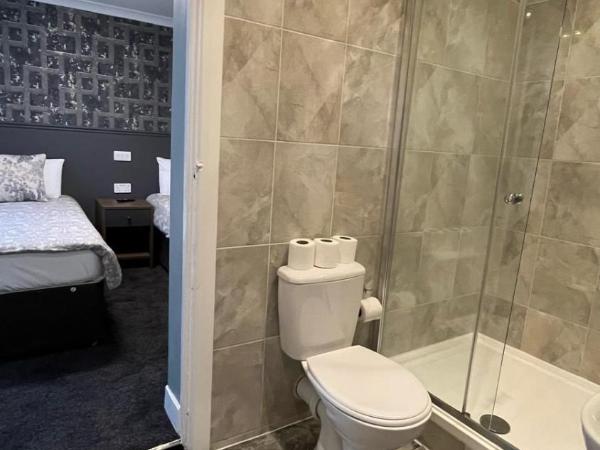 Charlotte Guest House : photo 5 de la chambre chambre quadruple