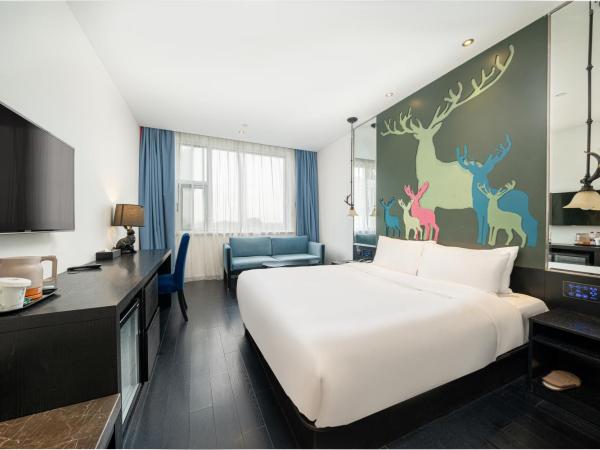 Orange Hotel Shanghai Hongqiao Airport Caoan Road Branch - Free Hongqiao Airport & Hongqiao Train station Shuttle Bus : photo 1 de la chambre chambre lit queen-size deluxe