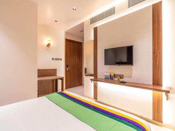 Treebo Tryst Heritage Grand - Thane : photo 3 de la chambre deluxe room with working desk & minibar