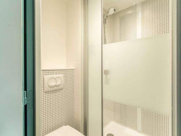 ibis budget Bourges : photo 8 de la chambre chambre triple avec 1 lit double et 1 lit superposé