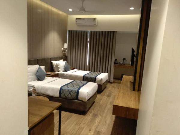 Pinnacle Grand Hotel : photo 1 de la chambre chambre deluxe double ou lits jumeaux